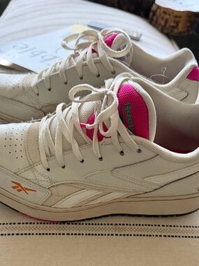 Sz 7 Reebok Women’s Off White Leather Athletic shoes, pink orange blue accents